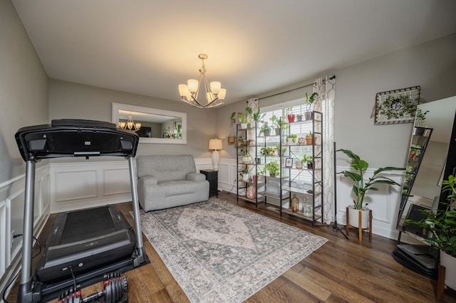 4526 Culpepper Cir, Murfreesboro, TN 37129 - workout room featuring a chandelier, wood finished floors, and a wainscoted wall