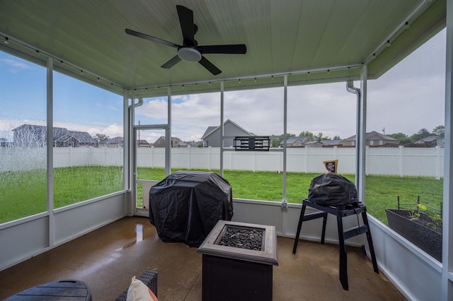 4526 Culpepper Cir, Murfreesboro, TN 37129 - sunroom featuring ceiling fan, a residential view, and an outdoor fire pit
