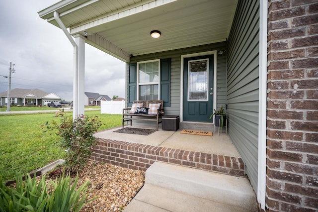 4526 Culpepper Cir, Murfreesboro, TN 37129 - doorway to property with a porch, a lawn, and a security system