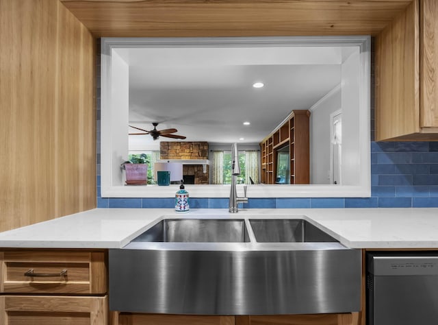 346 Lynnford Dr, Murfreesboro, TN 37128 - kitchen with stainless steel dishwasher, a sink, tasteful backsplash, ceiling fan, and light stone countertops