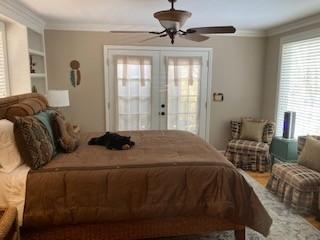 470 Askin Ln, Baxter, TN 38544 - bedroom featuring french doors, multiple windows, ornamental molding, and a ceiling fan