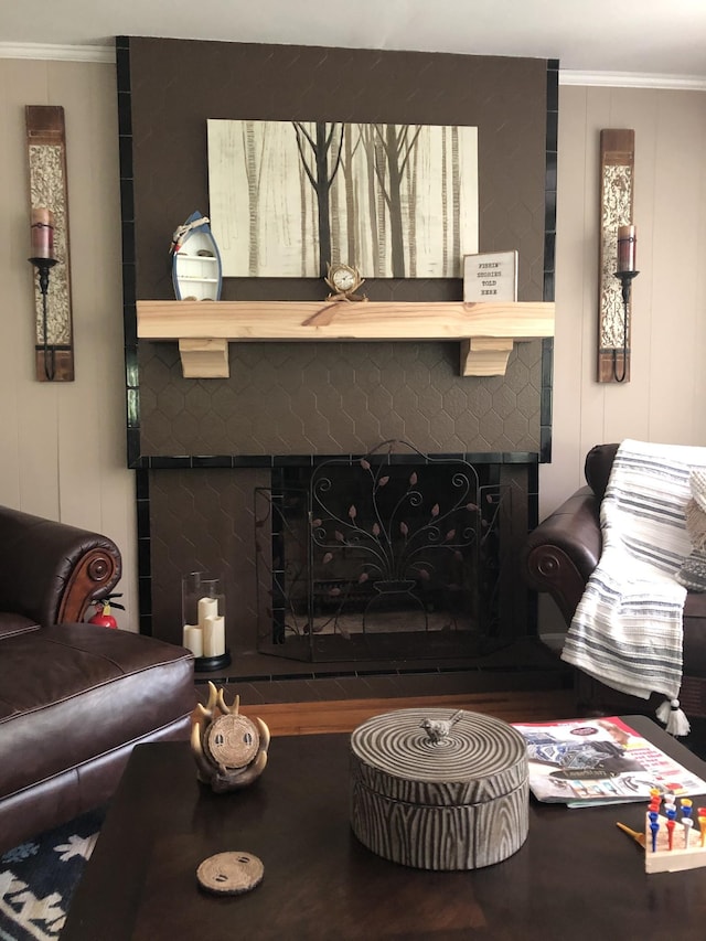 470 Askin Ln, Baxter, TN 38544 - living room featuring a fireplace, wood finished floors, and ornamental molding