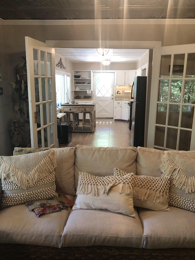 470 Askin Ln, Baxter, TN 38544 - living area with light tile patterned floors and ornamental molding