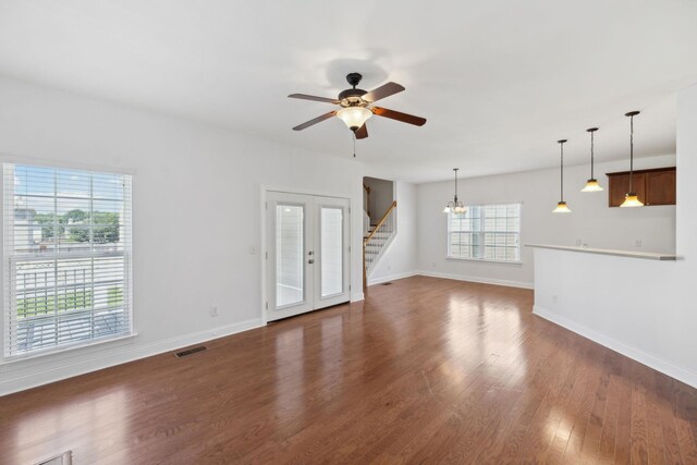 3511 Blaze Dr, Murfreesboro, TN 37128 - unfurnished living room featuring stairs, dark wood-type flooring, baseboards, and a ceiling fan