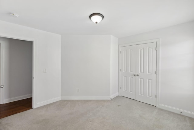 3511 Blaze Dr, Murfreesboro, TN 37128 - unfurnished bedroom featuring light colored carpet, baseboards, and a closet