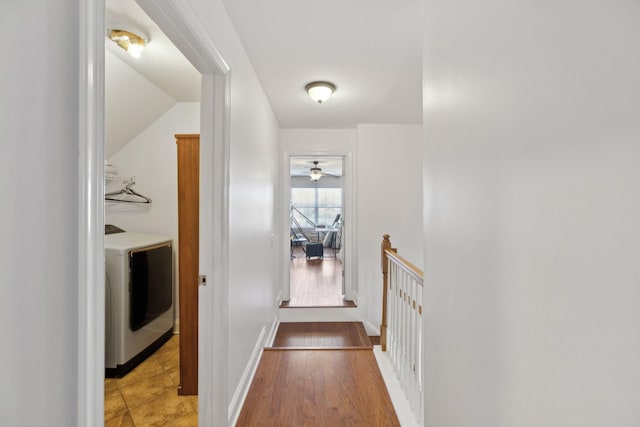 3511 Blaze Dr, Murfreesboro, TN 37128 - hallway featuring an upstairs landing, washer / clothes dryer, baseboards, and light wood-style floors