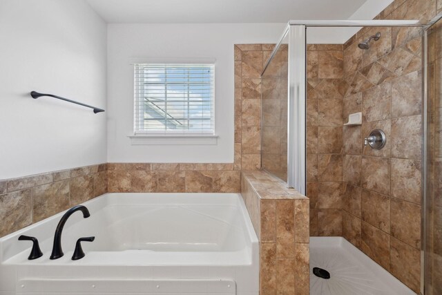 3511 Blaze Dr, Murfreesboro, TN 37128 - bathroom featuring a stall shower and a garden tub