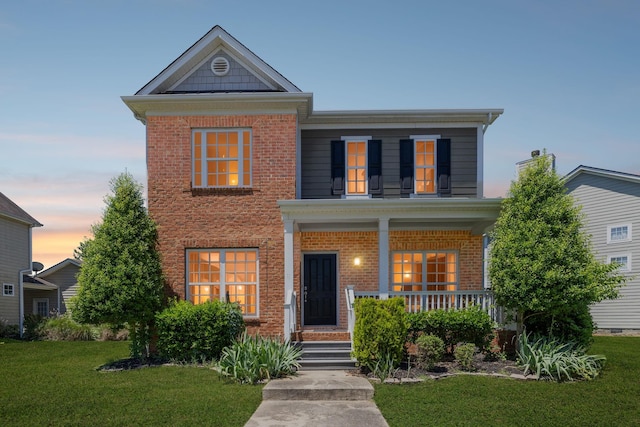 3511 Blaze Dr, Murfreesboro, TN 37128 - view of front of property with brick siding, a yard, and covered porch