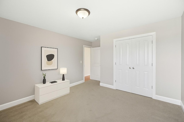 3511 Blaze Dr, Murfreesboro, TN 37128 - unfurnished bedroom with light colored carpet, baseboards, and a closet