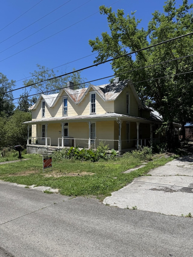 112 W Hackberry St, Centerville, TN 37033 - view of front of home featuring covered porch