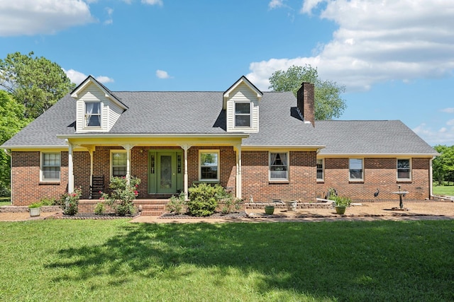 505 Shirley Rd, Smyrna, TN 37167 - cape cod house with a chimney, a front yard, brick siding, and a shingled roof