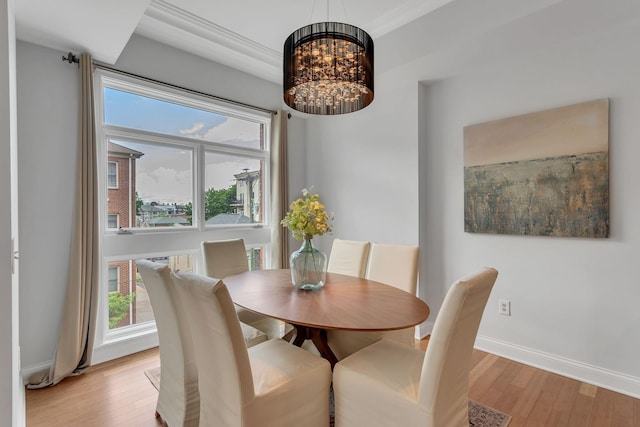110 31st Ave N Unit 301, Nashville, TN 37203 - dining room featuring light wood-type flooring, a chandelier, and baseboards