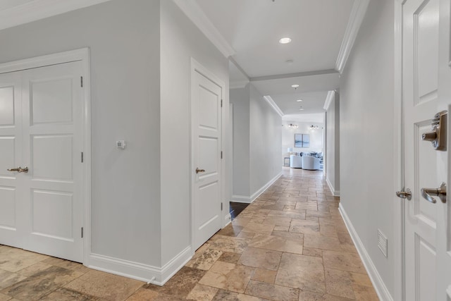 110 31st Ave N Unit 301, Nashville, TN 37203 - corridor with stone tile floors, crown molding, baseboards, and recessed lighting