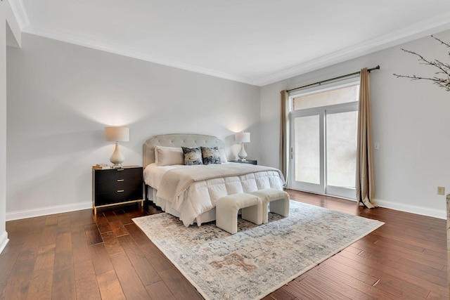 110 31st Ave N Unit 301, Nashville, TN 37203 - bedroom with crown molding, baseboards, dark wood finished floors, and access to exterior