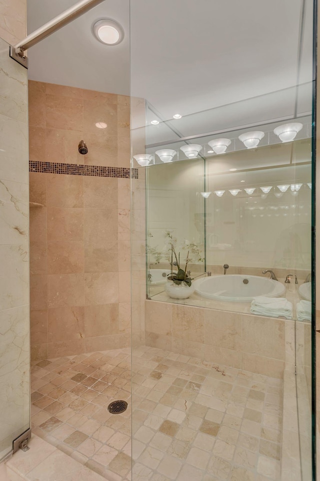 110 31st Ave N Unit 301, Nashville, TN 37203 - full bath with a tile shower, a bath, and tile patterned flooring