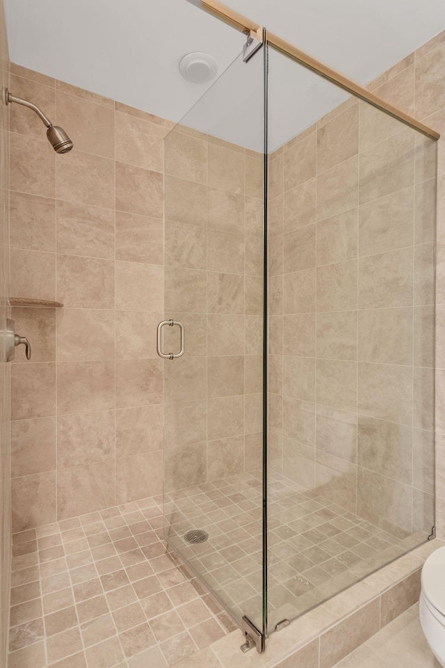 110 31st Ave N Unit 301, Nashville, TN 37203 - full bathroom featuring a shower stall and toilet