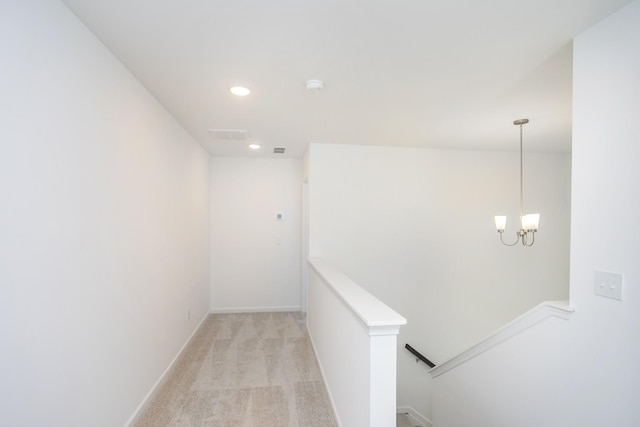 3044 Fernwood Ln, Columbia, TN 38401 - hallway featuring an upstairs landing, light carpet, recessed lighting, baseboards, and a chandelier