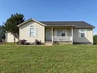 6133 Lee Ave, Murfreesboro, TN 37129 - ranch-style house with covered porch and a front lawn
