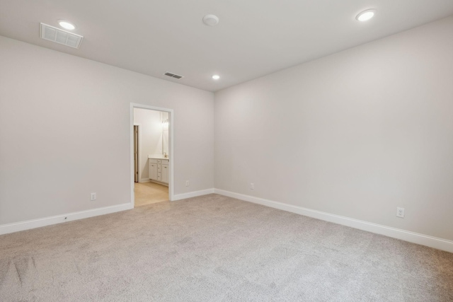 126 Cades Blf, Lebanon, TN 37087 - unfurnished room with light carpet, baseboards, and recessed lighting