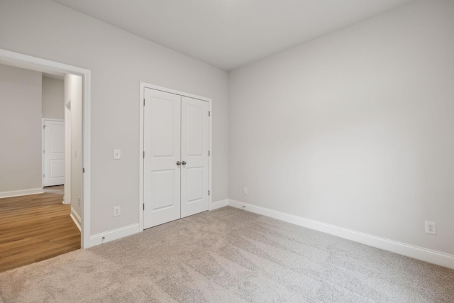 126 Cades Blf, Lebanon, TN 37087 - unfurnished bedroom with baseboards, carpet, and a closet