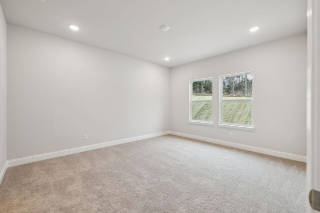 126 Cades Blf, Lebanon, TN 37087 - spare room with carpet, baseboards, and recessed lighting
