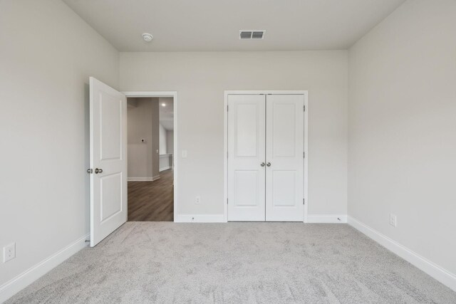 126 Cades Blf, Lebanon, TN 37087 - unfurnished bedroom with carpet, baseboards, and a closet