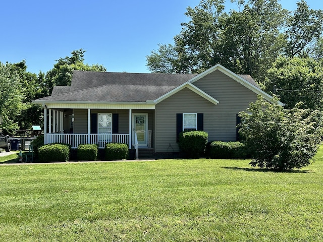 301 Maplewood Dr, Cornersville, TN 37047 - view of front of house with a porch, a front yard, and a shingled roof