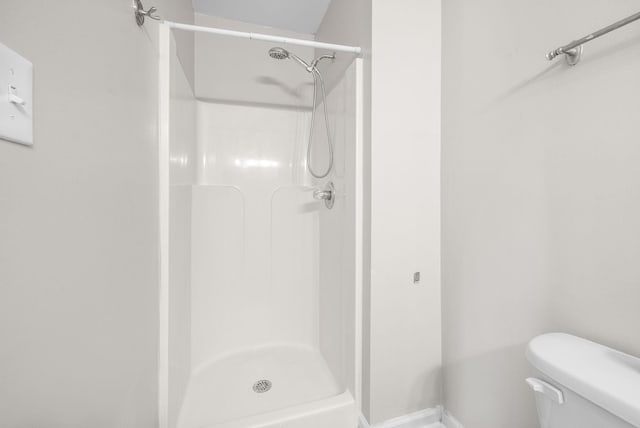 337 Atlantic Ave, Oak Grove, KY 42262 - bathroom featuring toilet, a stall shower, and baseboards