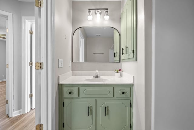 337 Atlantic Ave, Oak Grove, KY 42262 - bathroom with vanity, wood finished floors, and baseboards