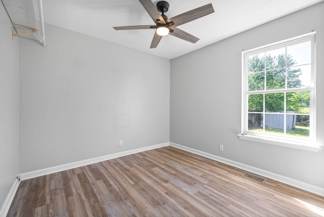 337 Atlantic Ave, Oak Grove, KY 42262 - spare room featuring wood finished floors, baseboards, and ceiling fan