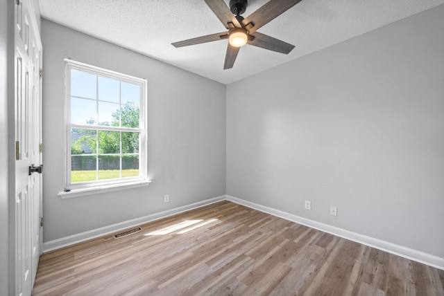 337 Atlantic Ave, Oak Grove, KY 42262 - empty room featuring light wood-type flooring, baseboards, a ceiling fan, and a textured ceiling