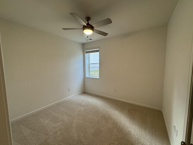 410 Blair Rd, Smyrna, TN 37167 - unfurnished room with carpet floors, baseboards, and ceiling fan