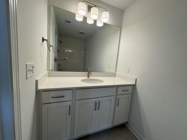 410 Blair Rd, Smyrna, TN 37167 - full bathroom featuring vanity, tile patterned floors, a shower, and baseboards