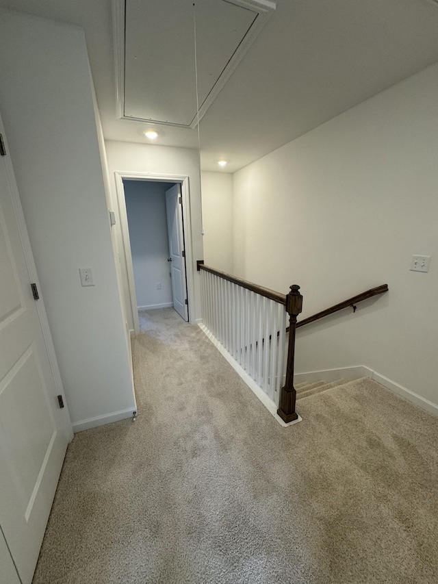 410 Blair Rd, Smyrna, TN 37167 - corridor featuring attic access, carpet floors, baseboards, and an upstairs landing