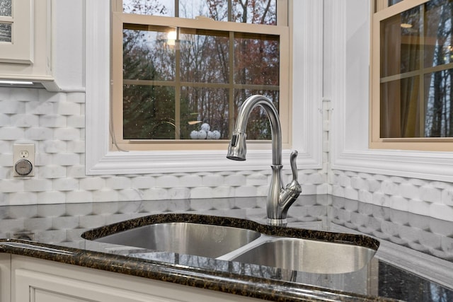 697 N Stewart Ln, Rising Fawn, GA 30738 - kitchen view of a sink, dark stone countertops, and white cabinets