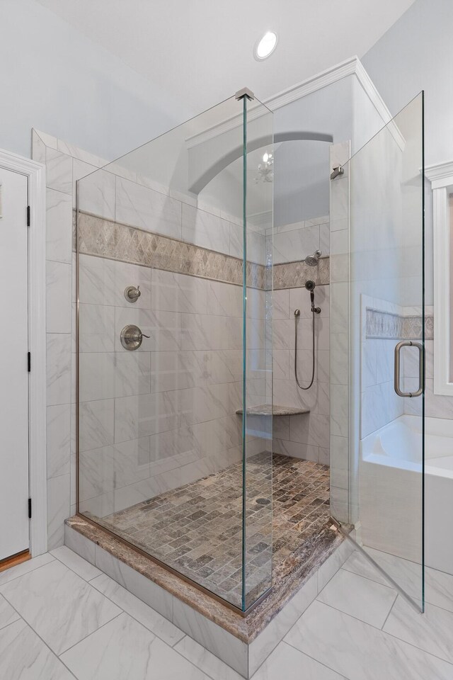 697 N Stewart Ln, Rising Fawn, GA 30738 - bathroom featuring marble finish flooring and a stall shower