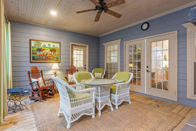 697 N Stewart Ln, Rising Fawn, GA 30738 - dining room with french doors, wood ceiling, wood walls, hardwood / wood-style flooring, and a ceiling fan