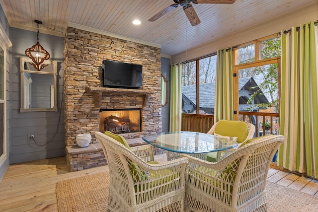 697 N Stewart Ln, Rising Fawn, GA 30738 - dining space featuring crown molding, ceiling fan, wood-type flooring, a stone fireplace, and recessed lighting