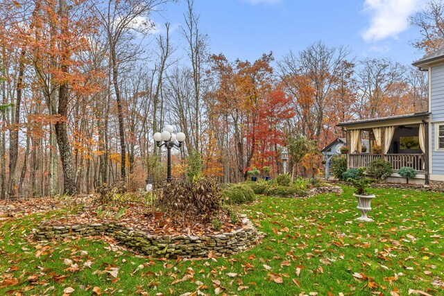 697 N Stewart Ln, Rising Fawn, GA 30738 - view of green lawn featuring covered porch