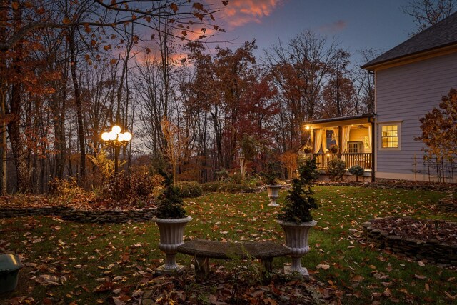 697 N Stewart Ln, Rising Fawn, GA 30738 - yard at dusk featuring a yard and a porch