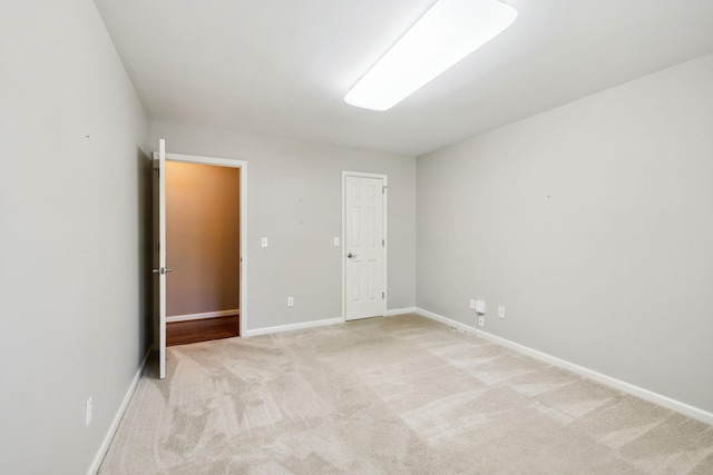 4348 Oakcrest Ln, Hermitage, TN 37076 - unfurnished bedroom featuring light colored carpet and baseboards
