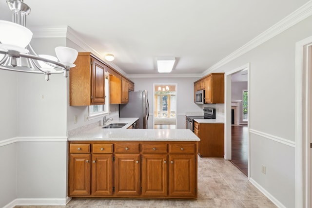 4348 Oakcrest Ln, Hermitage, TN 37076 - kitchen featuring stainless steel appliances, a sink, brown cabinetry, and ornamental molding