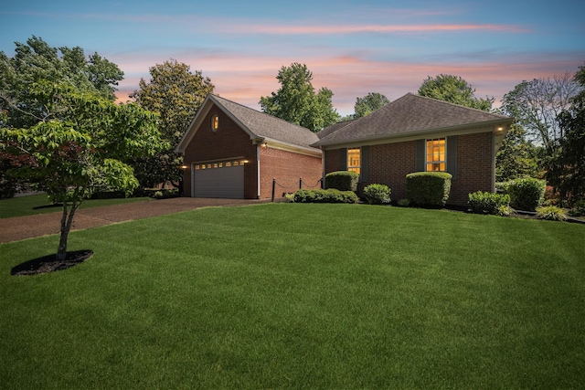 4348 Oakcrest Ln, Hermitage, TN 37076 - view of front of home with driveway, a front lawn, and brick siding