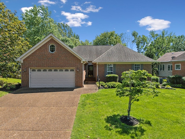4348 Oakcrest Ln, Hermitage, TN 37076 - view of front of home featuring driveway, an attached garage, a front lawn, and brick siding