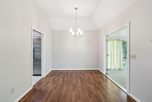 4348 Oakcrest Ln, Hermitage, TN 37076 - spare room featuring a chandelier, wood finished floors, lofted ceiling, and baseboards