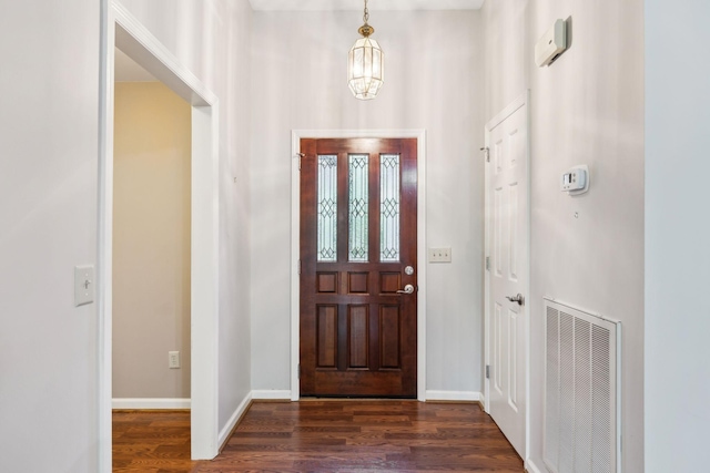 4348 Oakcrest Ln, Hermitage, TN 37076 - foyer featuring a chandelier, dark wood finished floors, and baseboards