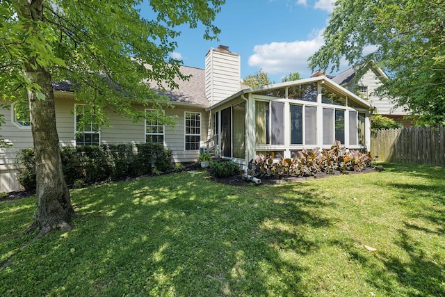 4348 Oakcrest Ln, Hermitage, TN 37076 - back of property with a sunroom and a chimney