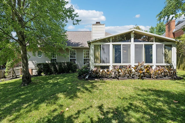 4348 Oakcrest Ln, Hermitage, TN 37076 - back of house featuring a sunroom and a chimney