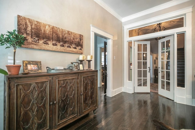 712 W Main St, Franklin, TN 37064 - entryway with french doors, dark wood finished floors, crown molding, baseboards, and a chandelier