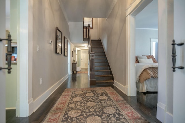 712 W Main St, Franklin, TN 37064 - foyer with wood finished floors, stairs, ornamental molding, and baseboards